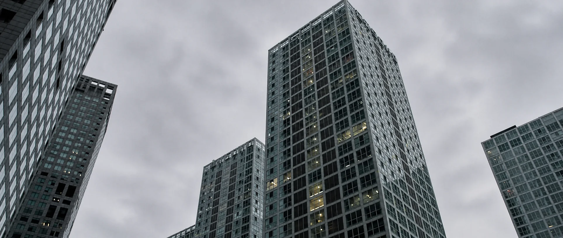 Tall office towers seen from street level in Beijing.