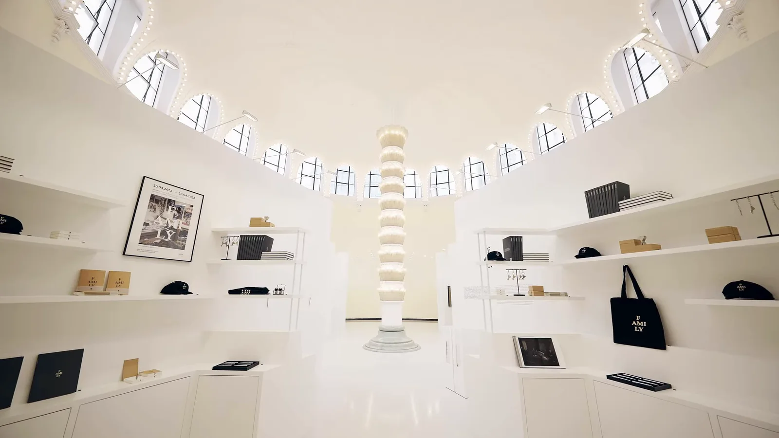 Bright F.AMI.LY Shanghai exhibition interior with display shelves and a central sculpture.