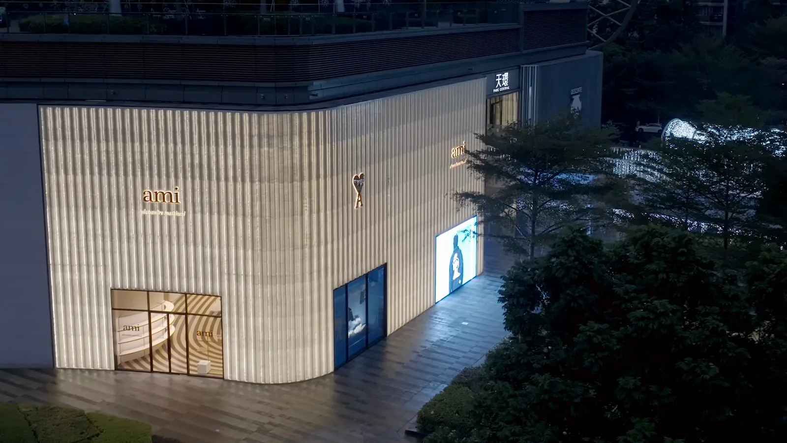 Exterior and interior details of the AMI Paris Guangzhou flagship at Park Central.