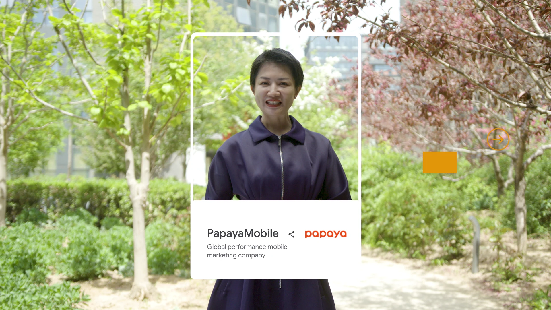 Outdoor portrait of the Papaya Mobile contributor with the original project graphics.