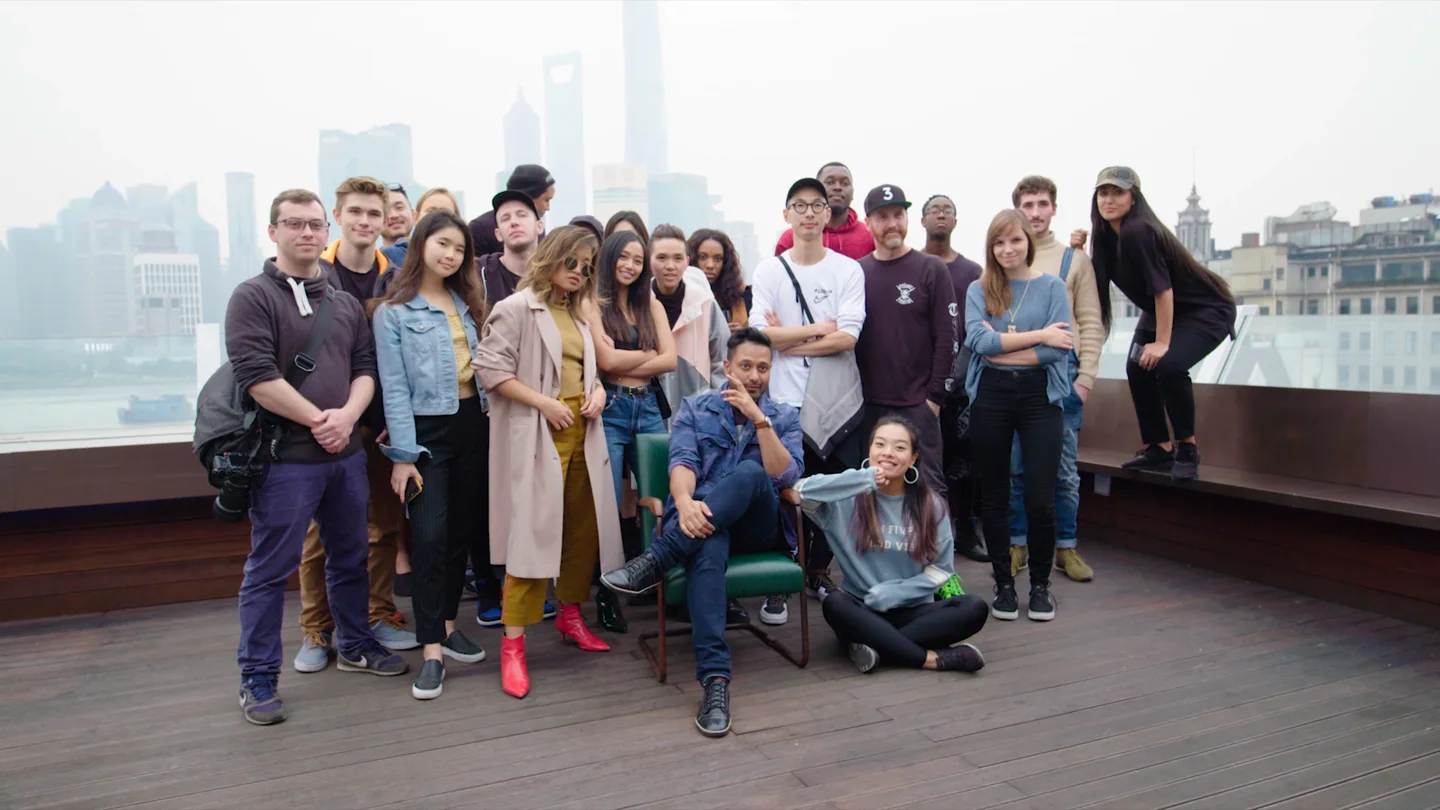 Event participants posing together on a Shanghai rooftop