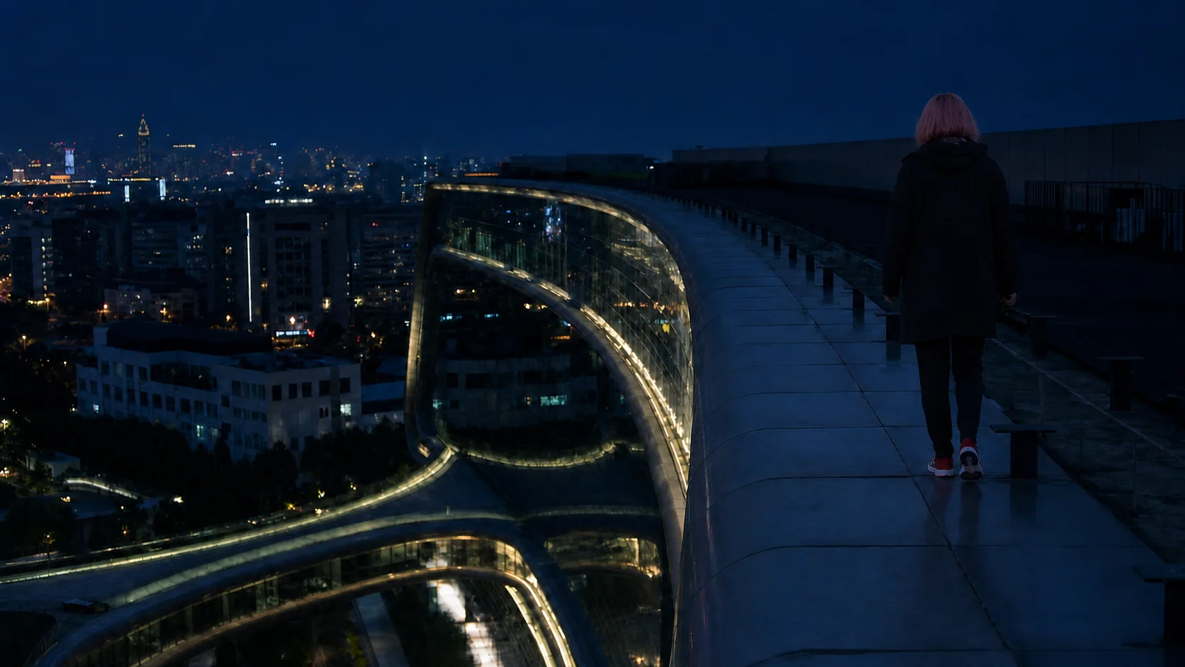Jennifer Bin walking along Sky Soho above Shanghai at night
