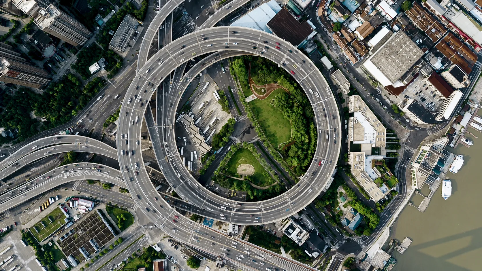 Circular elevated highway interchange around a green central park in Shanghai