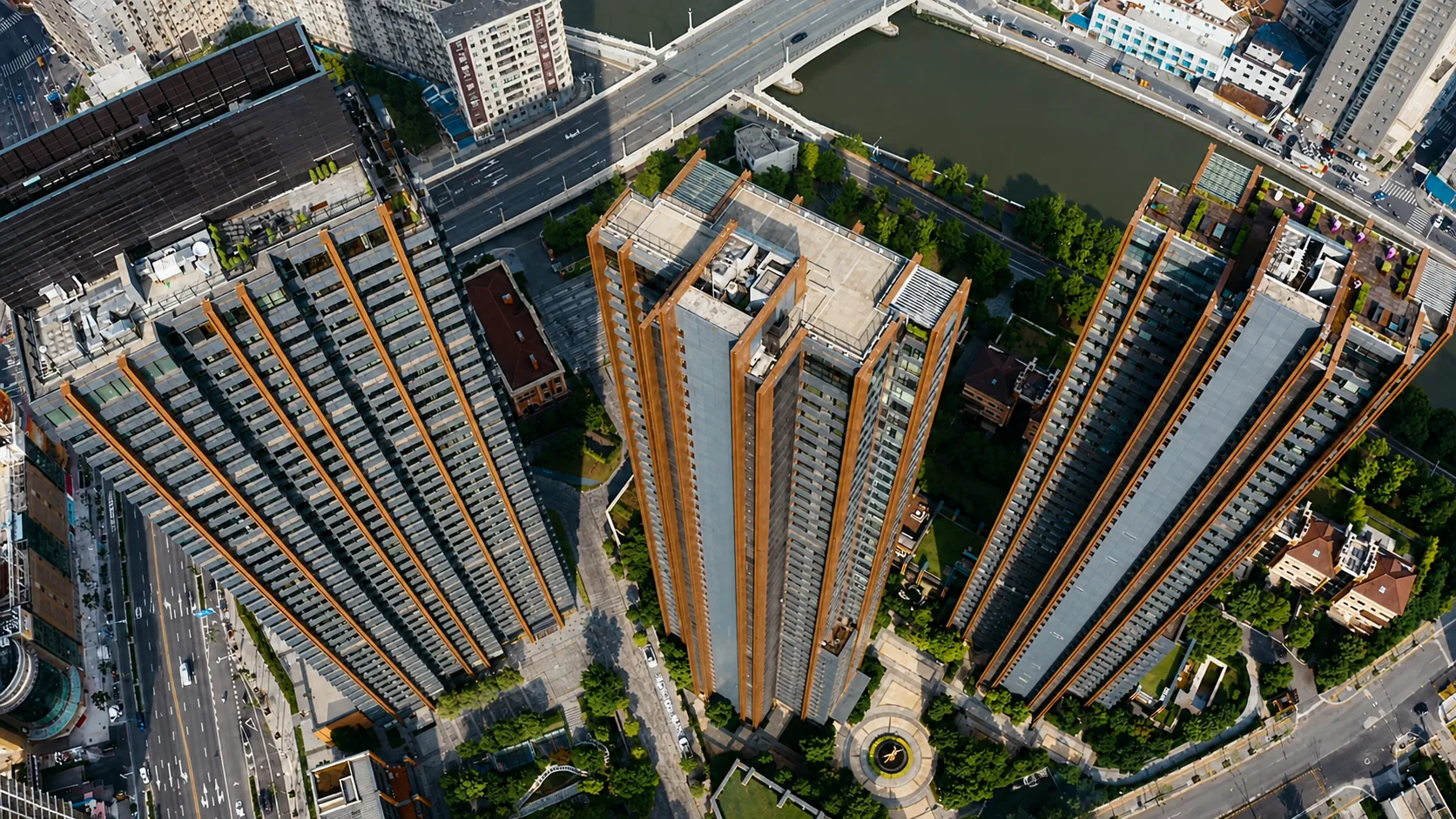 Top-down view of high-rise residential blocks, roads and a landscaped courtyard in Shanghai