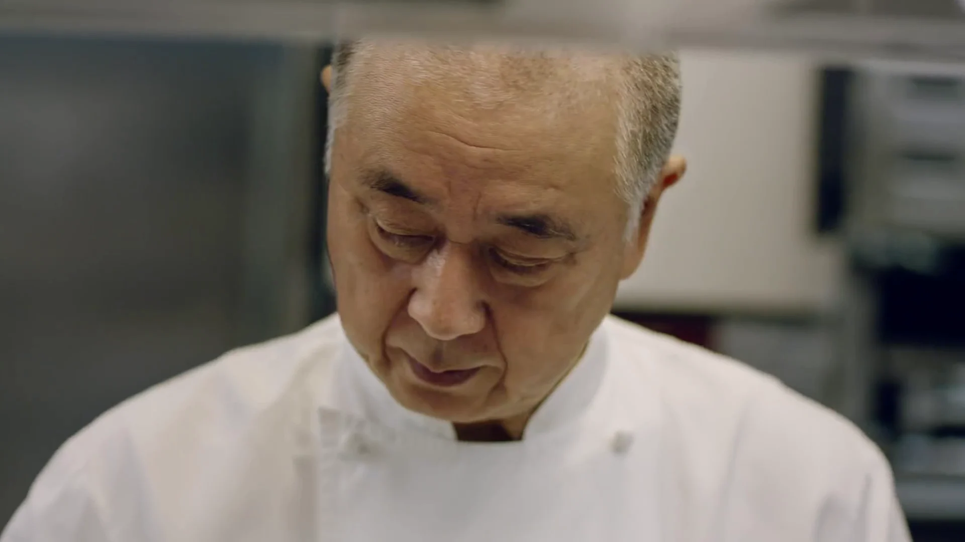 Chef concentrating while preparing food in a kitchen