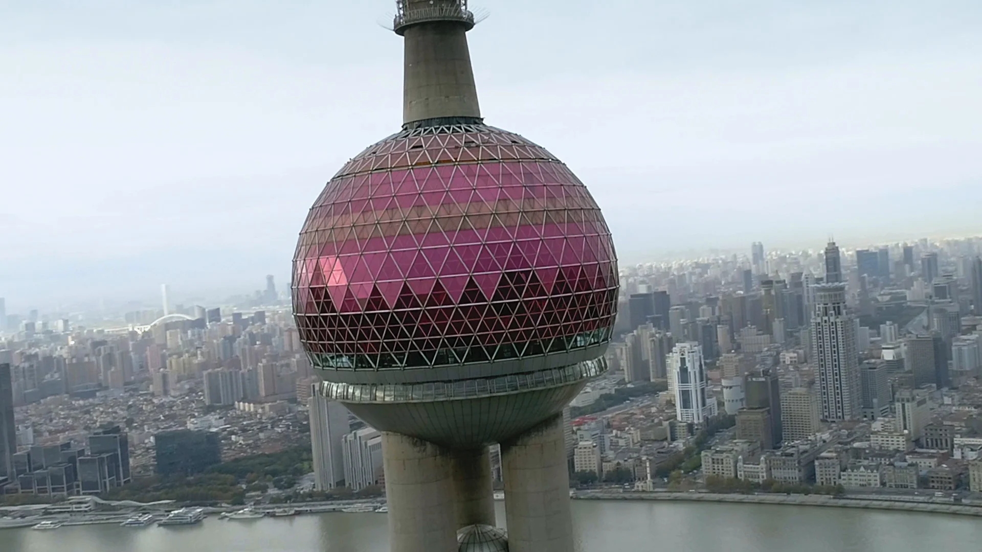 Oriental Pearl Tower and surrounding Shanghai buildings.