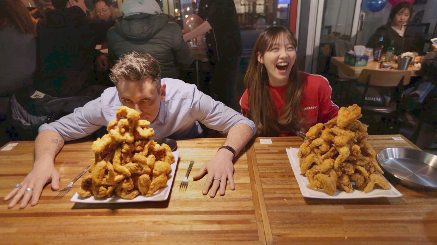 Aaron Craze and Duoyi at the food challenge.