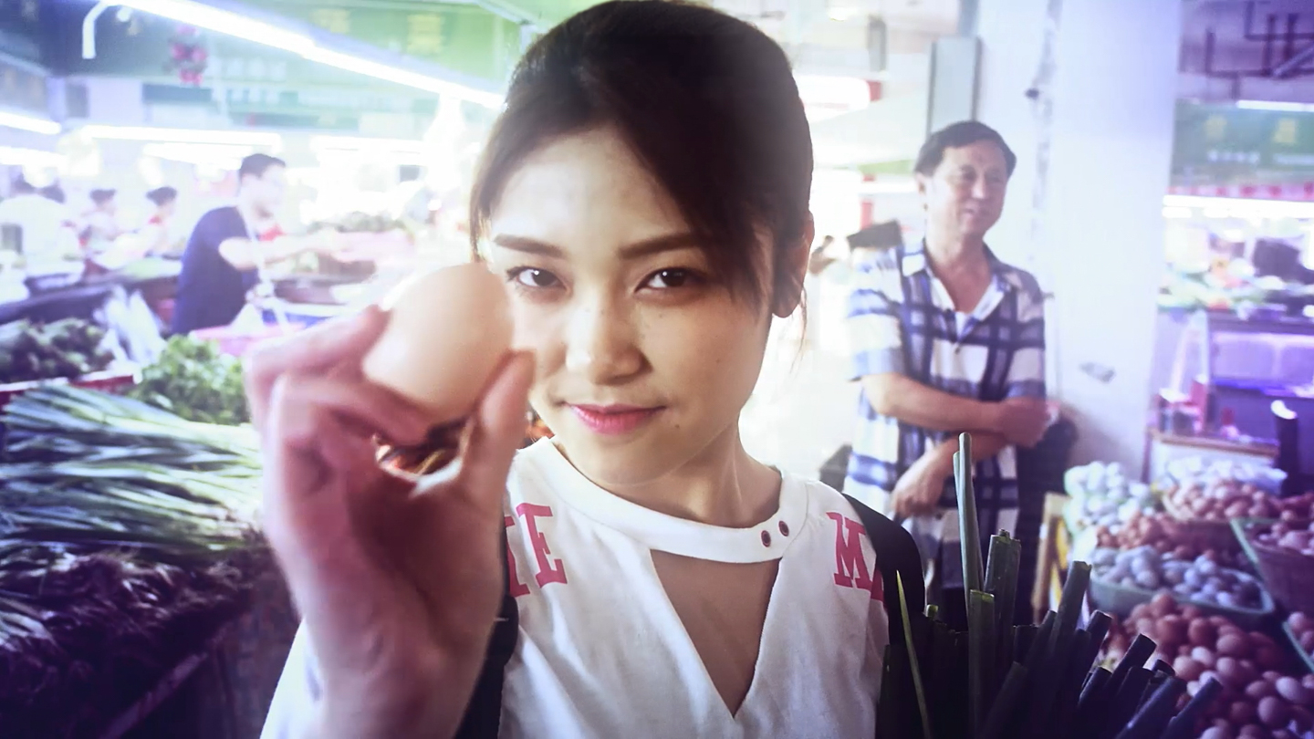 Ms Yeah in a market sequence.