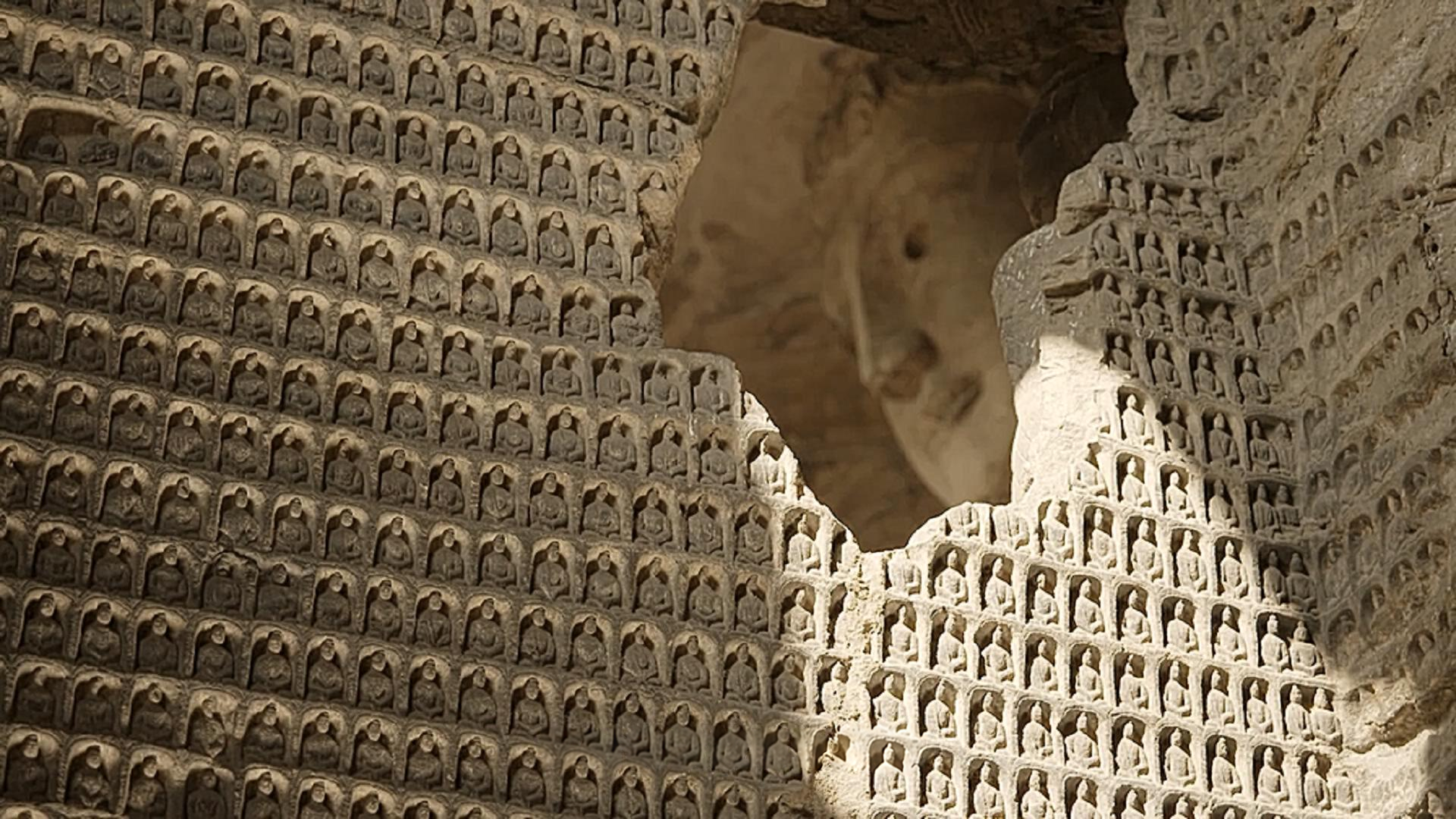 Sculptural detail inside a cave temple. Frame from the programme.