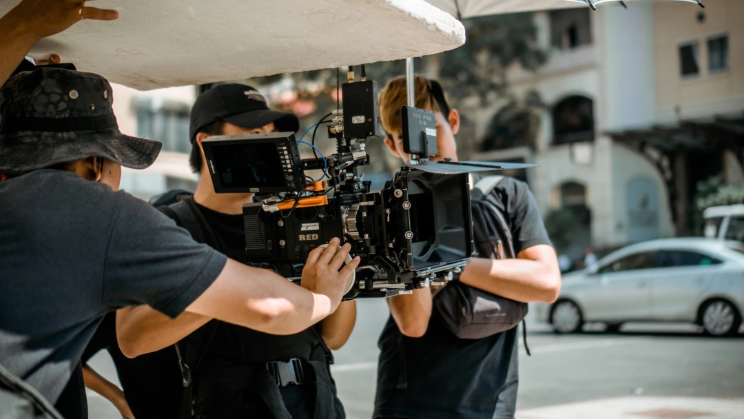 three men shooting crew