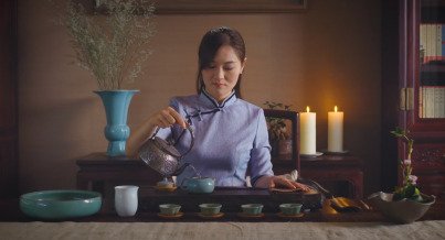 Chinese women pouring tea 1