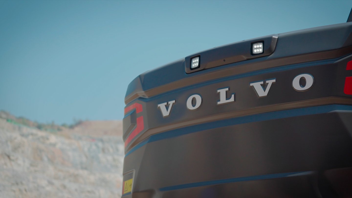 Rear counterweight and tail-light detail of a Volvo EC360 excavator