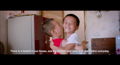 two boy hugging