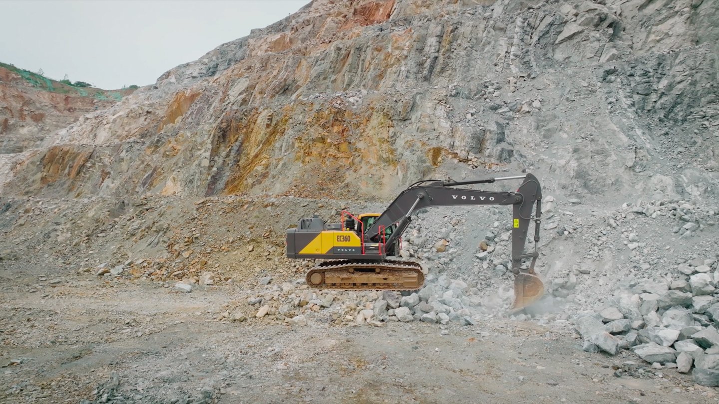 Volvo EC360 excavator working across the open limestone mine