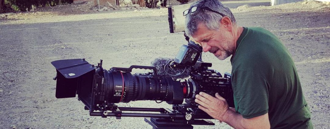 green shirt man shooting