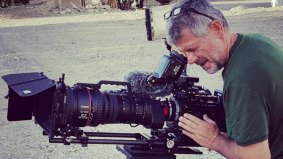 green shirt man shooting