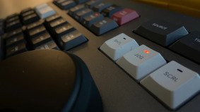 Specialized editing keyboard symbolizing professional video production and fixer services in China