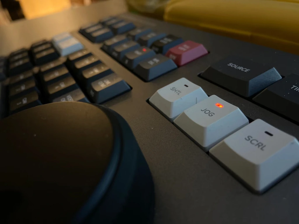 Specialized editing keyboard symbolizing professional video production and fixer services in China