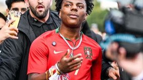 Influencer with red headphones streaming live from a pagoda in China