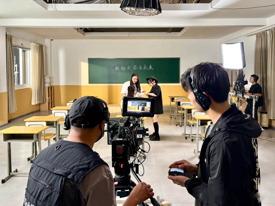 Behind the scenes of a classroom scene video shoot