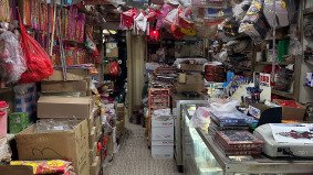 Interior of traditional joss paper shop in Monster Building – local character for cultural film projects