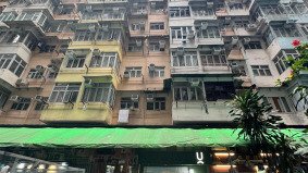 Exterior facade of Monster Building in Hong Kong – striking visual for film and photo production