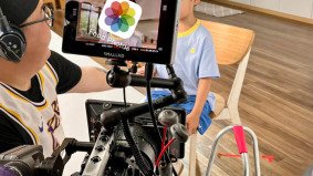 Video shooting fixer China filming a child during a video production