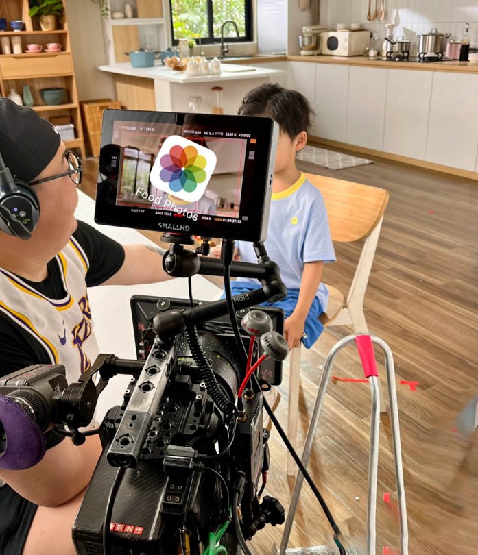 Video shooting fixer China filming a child during a video production