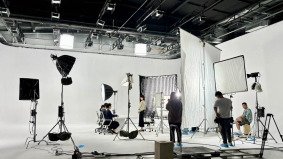 Video shooting fixer China filming a staged business meeting in a studio