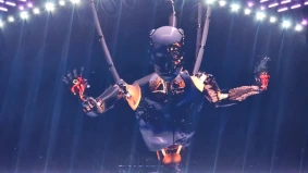 Stage setup for Akima at VAC music festival in China with LED screens and robotic visuals during sound testing — supported by Alchemist Films, a leading video production fixer in China