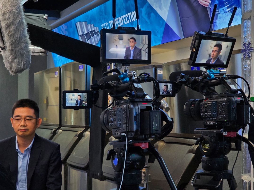 Two-camera interview filming at the office of a U.S. ice maker manufacturer, supported by Alchemist Films — premier China fixer and video production service for international clients