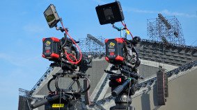 Two FX7 video cameras on tripods in front of LED screen at VAC Festival for Akima — Alchemist Films video production fixer in China